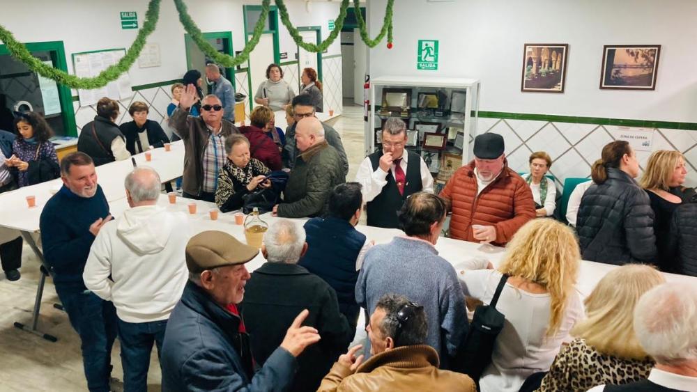 Chocolatada en la sede de la ONCE en Huelva