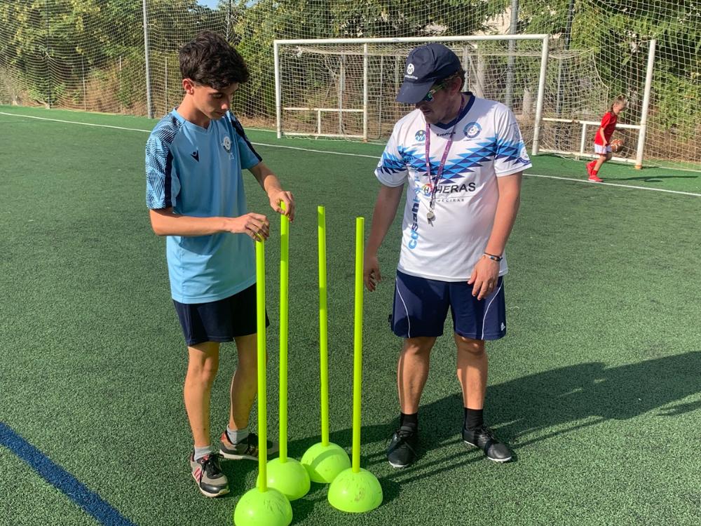 Antonio con el ayudante del entrenador